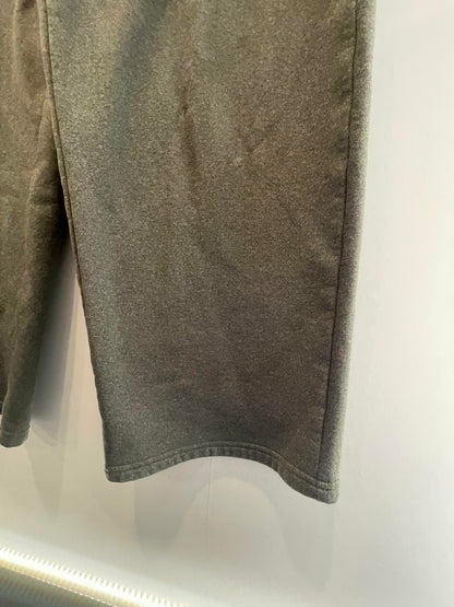 Pantalones deportivos grises para jóvenes Under Armour - Muy bueno 